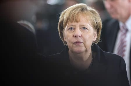 German Chancellor Angela Merkel arrives for a meeting of German state leaders at the chancellery in Berlin December 11, 2014. REUTERS/Hannibal Hanschke