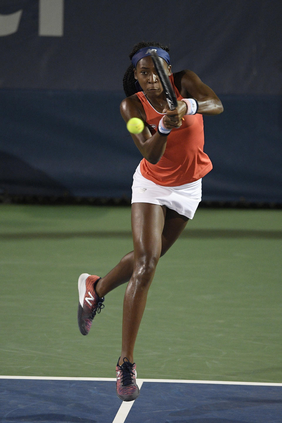Cori "Coco" Gauff returns the ball as she and Catherine McNally played a doubles match against Anna Kalinskaya, of Russia, and Miyu Kato, of Japan, in the Citi Open tennis tournament, Friday, Aug. 2, 2019, in Washington. (AP Photo/Nick Wass)