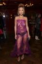 <p>At this point, I am losing count of how many naked dresses Rita Ora owns. The Brit attended the Netflix Golden Globe and Critics' Choice Nominee Toast in Hollywood wearing yet another iteration on the trend, this time featuring a see-through burgundy lace slip dress, teamed with black briefs and matching strappy heels.</p>