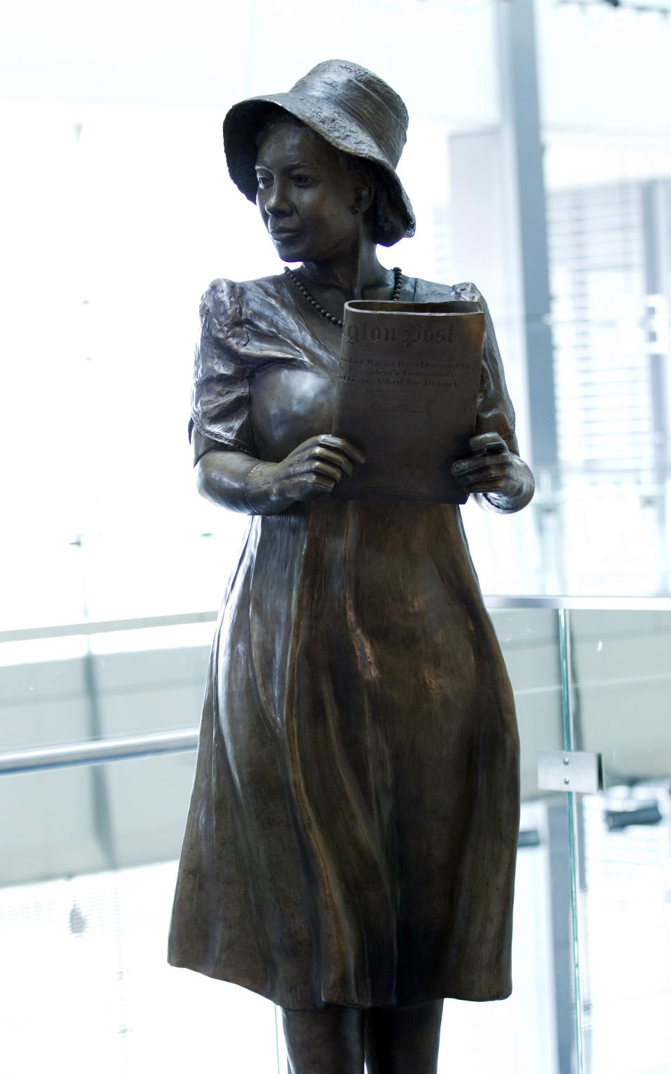 The sculpture of Alice Allison Dunnigan is seen during a ceremony at the Newseum, Friday, Sept. 21, 2018, in Washington. Dunnigan triumphed over sexism and racism to become the first black woman accredited to cover the White House. (AP Photo/Jose Luis Magana)