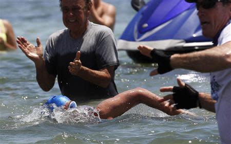 U.S. long-distance swimmer Diana Nyad, 64, completes her swim from Cuba as she arrives in Key West, Florida, September 2, 2013. REUTERS/Andrew Innerarity