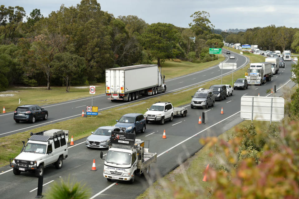 Hundreds of cars are seen queuing at the Queensland border. Source: Getty Images