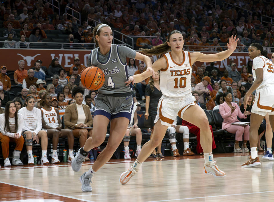 Kansas State guard Serena Sundell (4) drives against Texas guard Shay Holle (10) during the first half of an NCAA college basketball game, Sunday, Feb. 4, 2024, in Austin, Texas. (AP Photo/Michael Thomas)