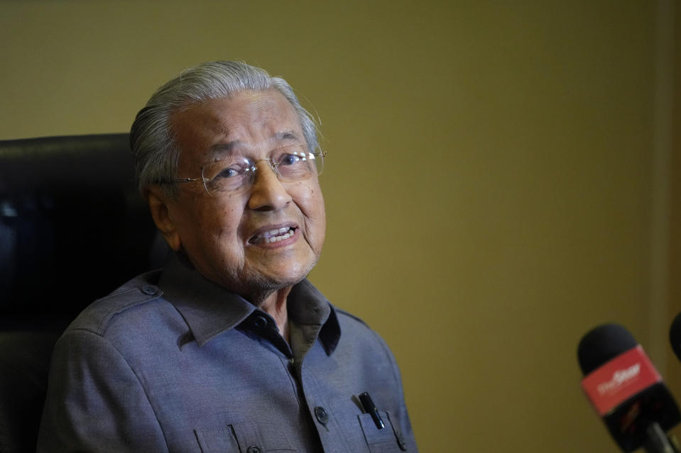 Former Malaysian Prime Minister Mahathir Mohamad speaks during a news conference at his office in Putrajaya, Malaysia, Monday, Jan. 22, 2024. Mahathir Mohamad said a graft probe into his son's wealth was politically motivated to undermine the opposition. (AP Photo/Vincent Thian)