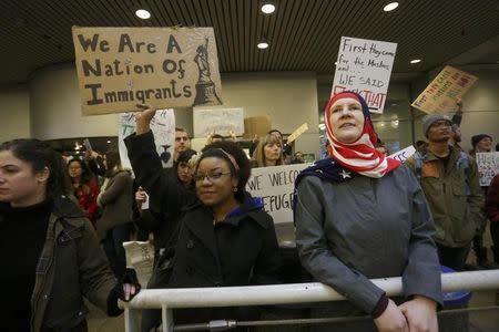 Activists gather at Portland International Airport to protest against President Donald Trump's executive action travel ban in Portland, Oregon, U.S. January 29, 2017. REUTERS/Steve Dipaola