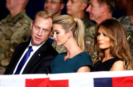 Deputy Secretary of Defense Patrick Shanahan speaks with White House Advisor Ivanka Trump before U.S. President Donald Trump announces his strategy for the war in Afghanistan during an address from Fort Myer, Virginia, U.S., August 21, 2017. REUTERS/Joshua Roberts