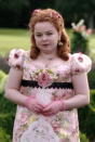 <p> While usually decked out in bright dresses, Penelope opted for a more demure look in a blush floral dress with chiffon puffed cap sleeves and lace detailing. </p>