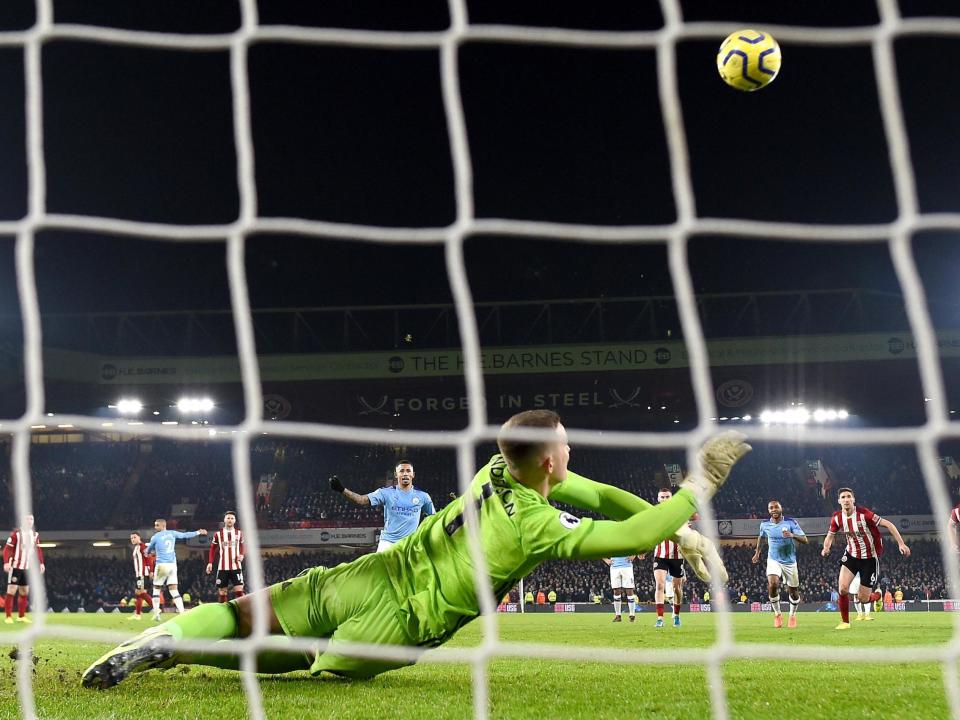 Sheffield United goalkeeper Dean Henderson saves Gabriel Jesus's penalty: Getty Images