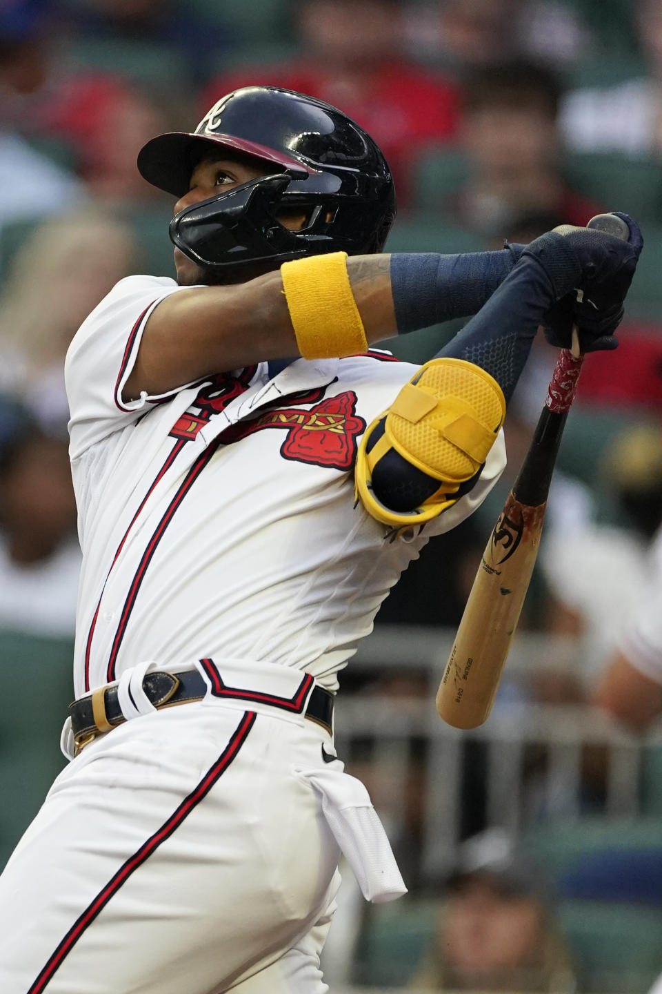 Atlanta Braves' Ronald Acuna Jr. watches his solo home run in the first inning of the team's baseball game against the Oakland Athletics on Tuesday, June 7, 2022, in Atlanta. (AP Photo/John Bazemore)