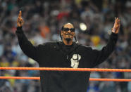 Snoop Dogg has made multiple Wrestlemania appearances. At Wrestlemania XXIV, he was the <a href="https://www.wwe.com/videos/snoop-dogg-arrives-grandest-stage-them-all-wrestlemania-xxiv" rel="nofollow noopener" target="_blank" data-ylk="slk:M.C. for the Bunnymania match;elm:context_link;itc:0;sec:content-canvas" class="link ">M.C. for the Bunnymania match</a>. Snoop Dogg also appeared in a backstage segment with Theodore Long at Wrestlemania XXVII. His most recent spot was a <a href="https://www.youtube.com/watch?v=u4Y188Zl8bw" rel="nofollow noopener" target="_blank" data-ylk="slk:performance of "Sky's the Limit";elm:context_link;itc:0;sec:content-canvas" class="link ">performance of "Sky's the Limit"</a> during Sasha Banks' entrance at Wrestlemania 32.