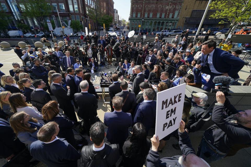 Reporters surround Dominion Voting Systems lawyers during a news conference in Wilmington, Del., after the defamation lawsuit by Dominion against Fox News was settled April 18, 2023. <a href="https://newsroom.ap.org/detail/PicturesoftheWeek-NorthAmerica-PhotoGallery/b8917d7cb42c459396ef17fe971ddcc3/photo?Query=Fox%20News&mediaType=photo&sortBy=arrivaldatetime:desc&dateRange=Anytime&totalCount=4879&currentItemNo=8" rel="nofollow noopener" target="_blank" data-ylk="slk:AP Photo/Julio Cortez;elm:context_link;itc:0;sec:content-canvas" class="link ">AP Photo/Julio Cortez</a>