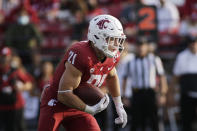 Washington State running back Max Borghi carries the ball during the second half of an NCAA college football game against Portland State, Saturday, Sept. 11, 2021, in Pullman, Wash. (AP Photo/Young Kwak)