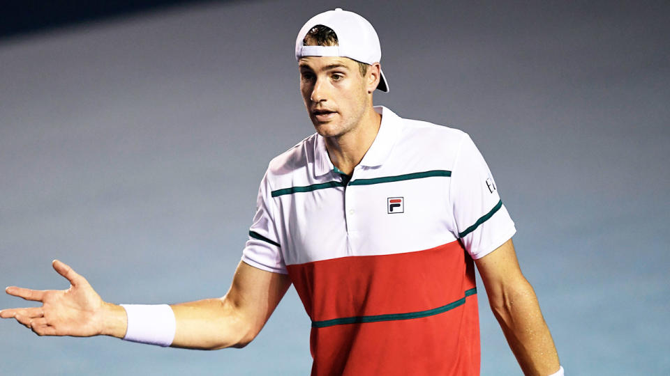 America's No.1 tennis player John Isner is angered at a point.