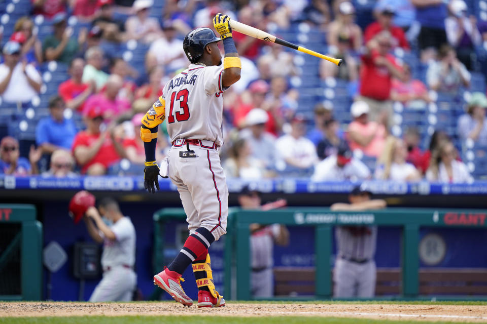 Atlanta Braves' Ronald Acuna Jr. reacts after striking out against Philadelphia Phillies pitcher Zack Wheeler during the sixth inning of a baseball game, Thursday, June 10, 2021, in Philadelphia. (AP Photo/Matt Slocum)