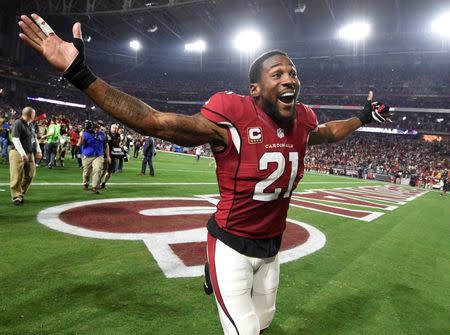 January 16, 2016; Glendale, AZ, USA; Arizona Cardinals cornerback Patrick Peterson (21) celebrates the 26-20 victory against Green Bay Packers in the NFC Divisional round playoff game at University of Phoenix Stadium. Mandatory Credit: Kyle Terada-USA TODAY Sports