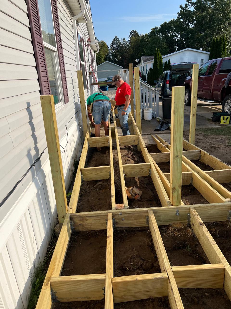 Two Helping Hands members build ramp at the home of a member of Clay United Methodist Church.