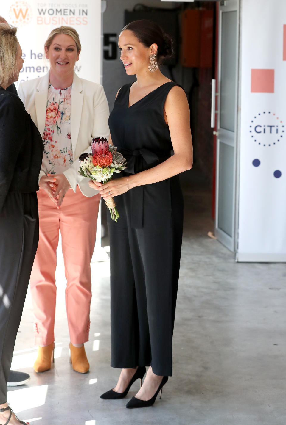 The Duchess of Sussex wearing her Everlane jumpsuit during the royal tour of South Africa on September 25, 2019. [Photo: Getty]
