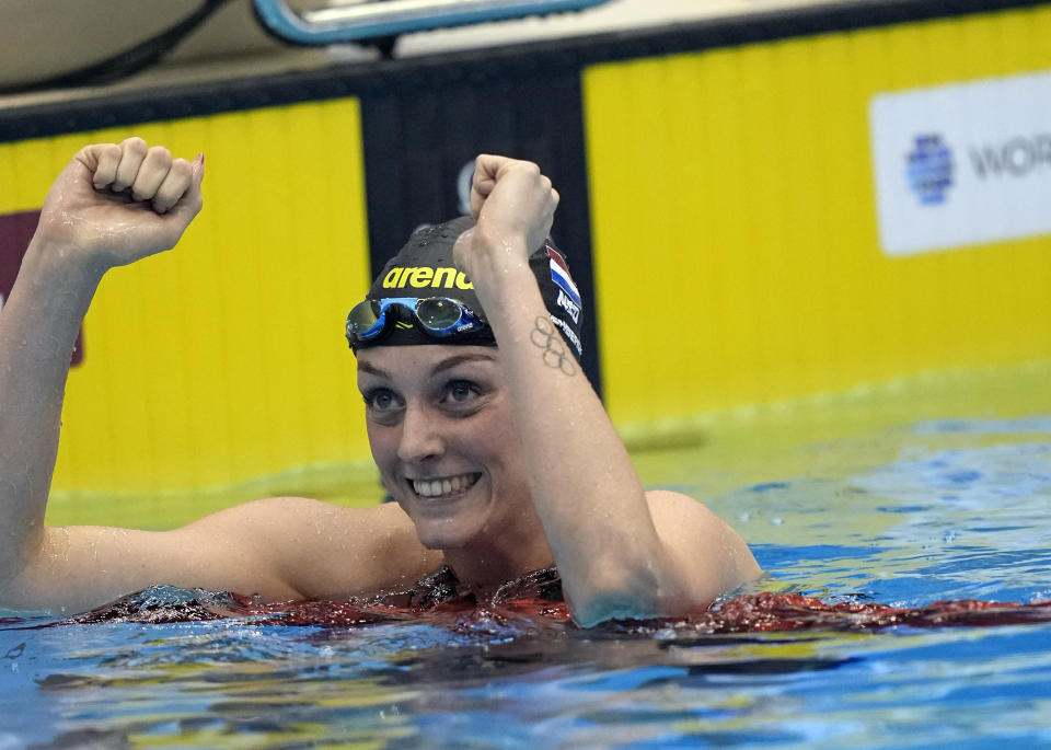 Mollie O'Callaghan, of Australia, celebrates after winning the women's 100-meter freestyle final at the World Swimming Championships in Fukuoka, Japan, Friday, July 28, 2023. (AP Photo/Nick Didlick)