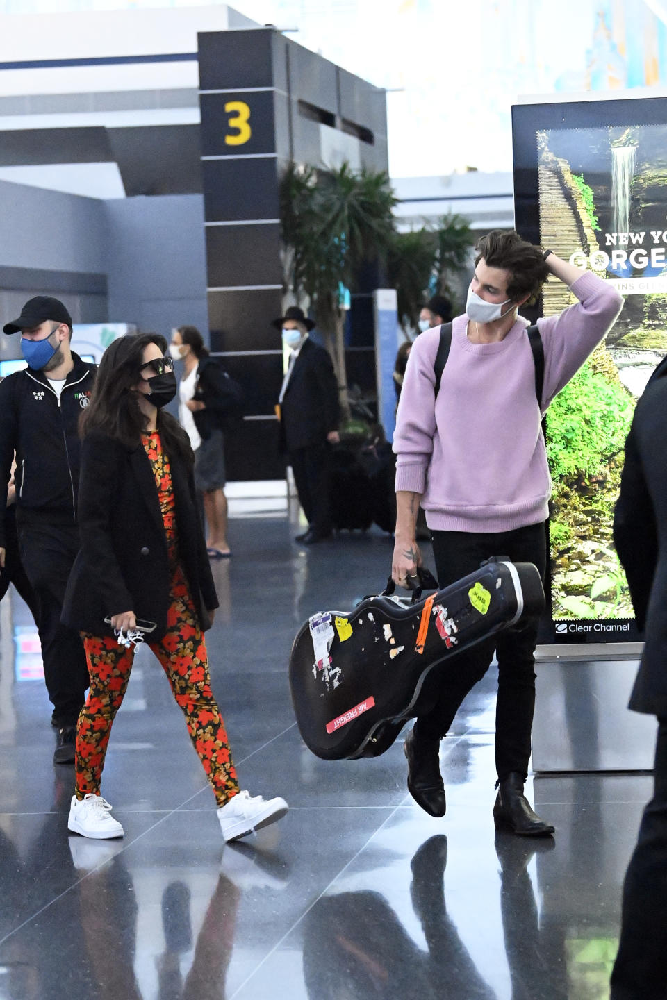 Shawn Mendes and Camila Cabello arrive at JFK International Airport in New York City. - Credit: Elder Ordonez / SplashNews.com