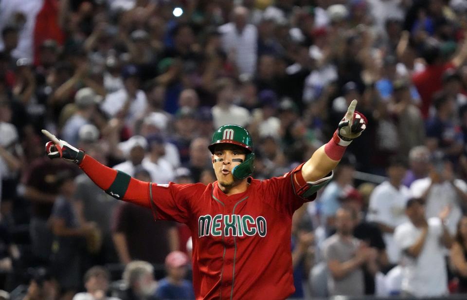 Mexico's Joey Meneses celebrates his 2-run home run against USA.