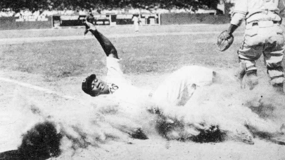 Josh Gibson slides home safely during the 1944 Negro Leagues East-West All-Star Game at Comiskey Park in Chicago. - Mark Rucker/Transcendental Graphics/Getty Images
