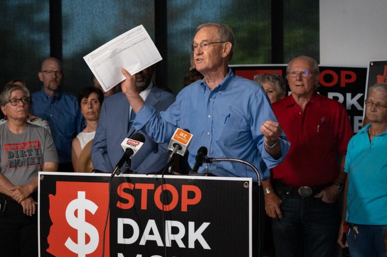 Terry Goddar, former Arizona attorney general, speaks during a Dark Money press conference on Aug. 22, 2022, at the Outlier Center in Phoenix.