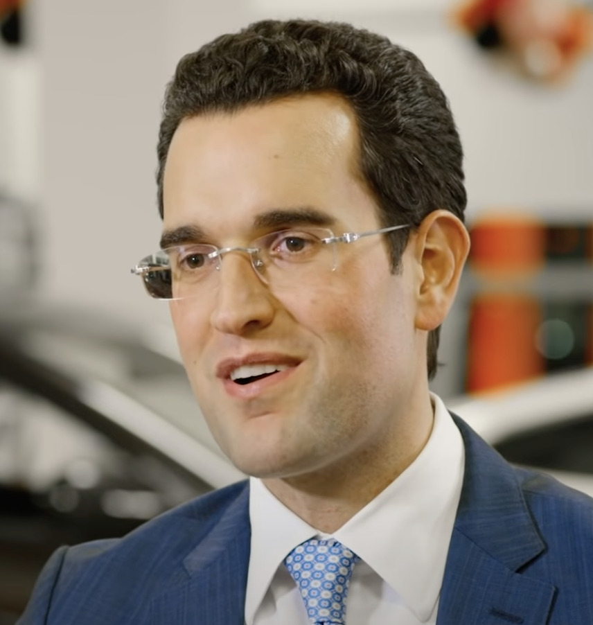 eric frehsee, president of tamaroff motors, in suit and tie