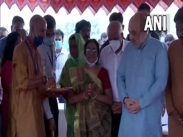 Union Home Minister Amit Shah laying foundation stone of restoration work of Pansar village lake in Gandhinagar (Photo/ANI)