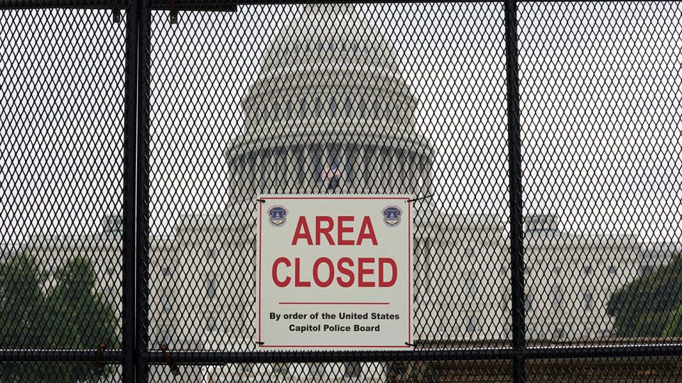 The U.S. Capitol is seen behind fencing that was erected in the wake of the January 6 insurrection, which is expected to be taken down as early as tomorrow in Washington, U.S., July 8, 2021. (Kevin Lamarque/File Photo/Reuters)