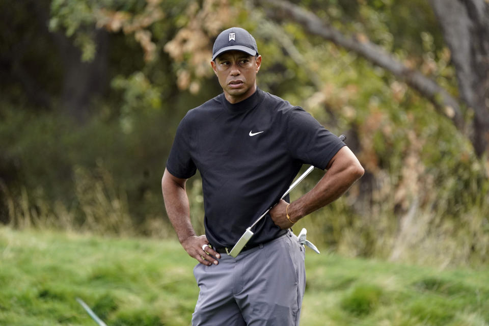 Tiger Woods waits on the 10th green during the first round of the Zozo Championship golf tournament Thursday, Oct. 22, 2020, in Thousand Oaks, Calif. (AP Photo/Marcio Jose Sanchez)