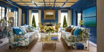 <p>This <a href="https://www.elledecor.com/design-decorate/house-interiors/a8631/most-beautiful-homes-in-east-hampton/" rel="nofollow noopener" target="_blank" data-ylk="slk:Celerie Kemble-designed living room;elm:context_link;itc:0;sec:content-canvas" class="link ">Celerie Kemble-designed living room</a> features a creative mix of accent colors, including soft yellow, which work beautifully with the high-gloss blue walls.</p>