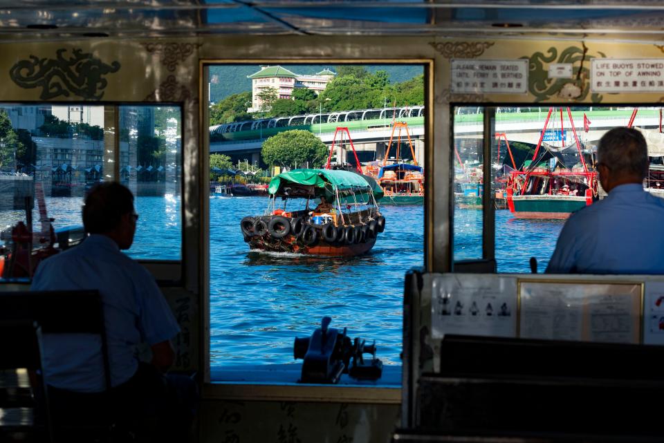 Tourist rides on sampans at Aberdeen port, Hong Kong.