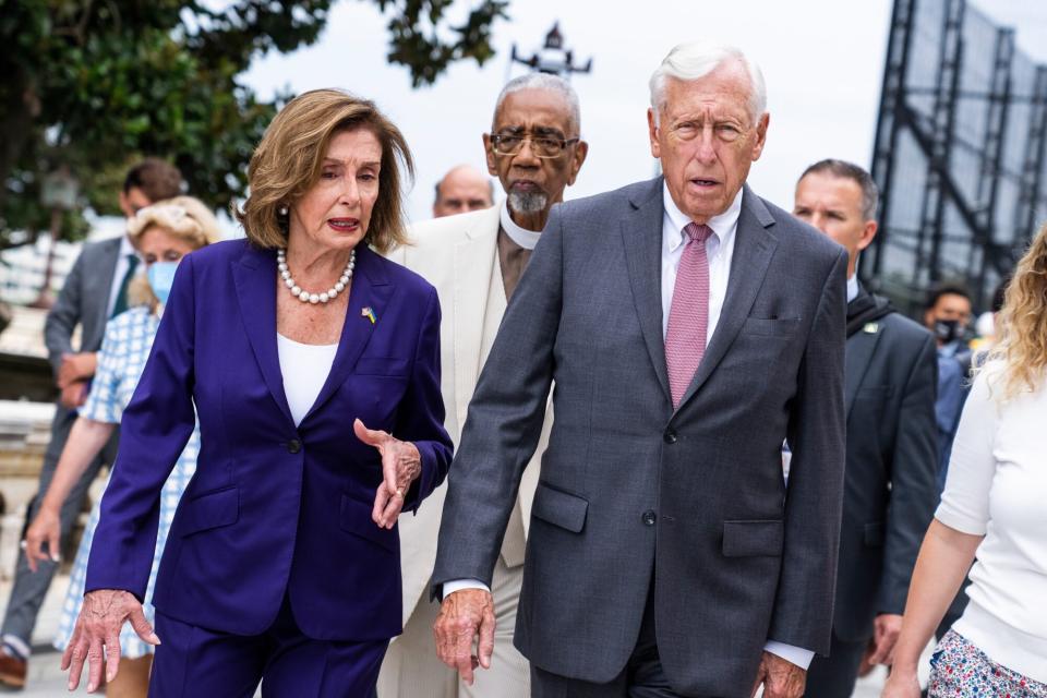 UNITED STATES - JULY 29: From left, Speaker of the House Nancy Pelosi, D-Calif., Rep. Bobby Rush, D-Ill., and House Majority Leader Steny Hoyer, D-Md., are seen after a bill enrollment ceremony for the Creating Helpful Incentives to Produce Semiconductors (CHIPS) and Science Act of 2022, on the West Front of the U.S. Capitol on Friday, July 29, 2022. (Tom Williams/CQ-Roll Call, Inc via Getty Images)
