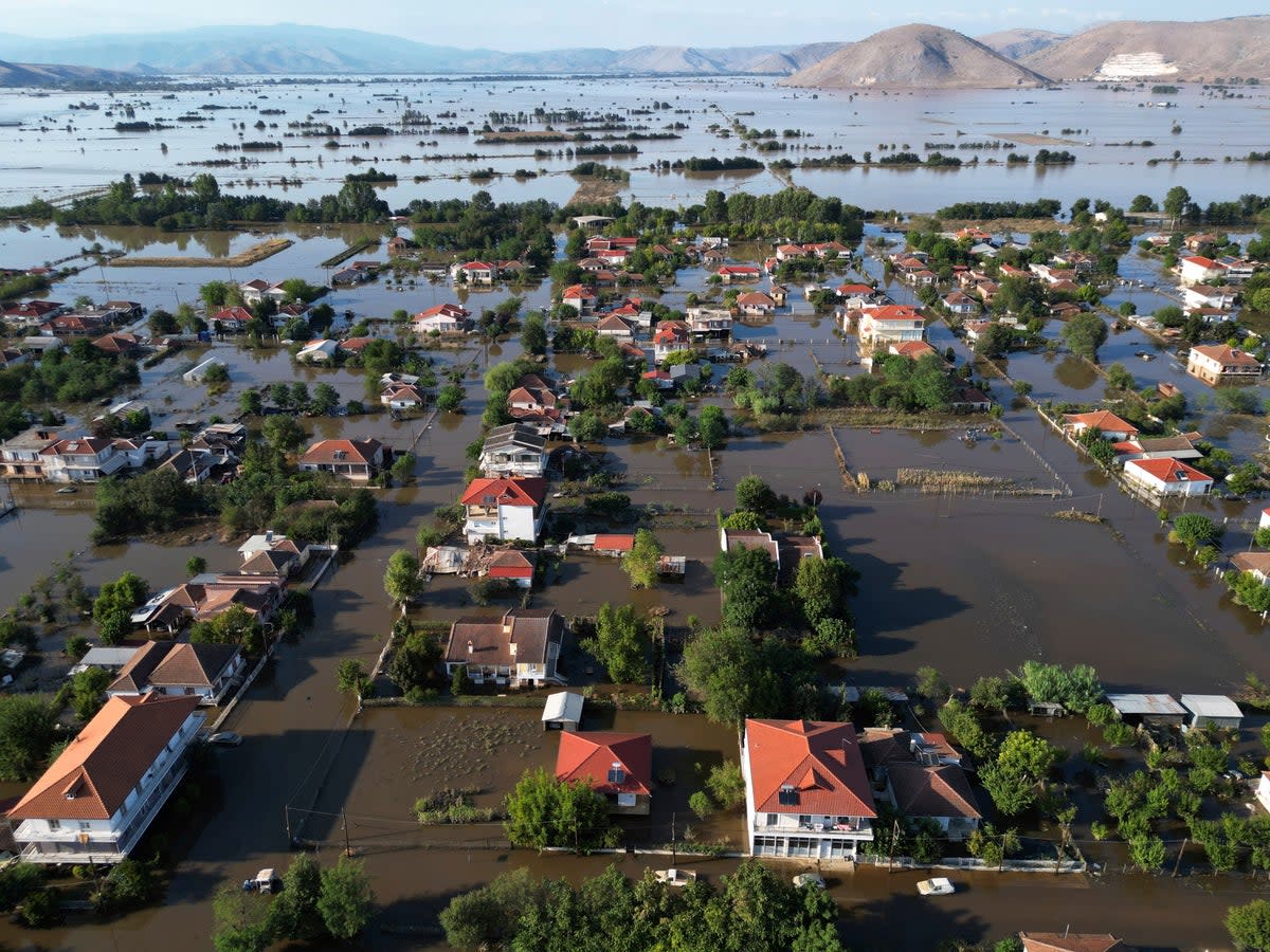 Floodwaters and mud cover the town of Palamas, after the country’s rainstorm record, in Karditsa, Thessaly region, central Greece, 8 September 2023 (AP)