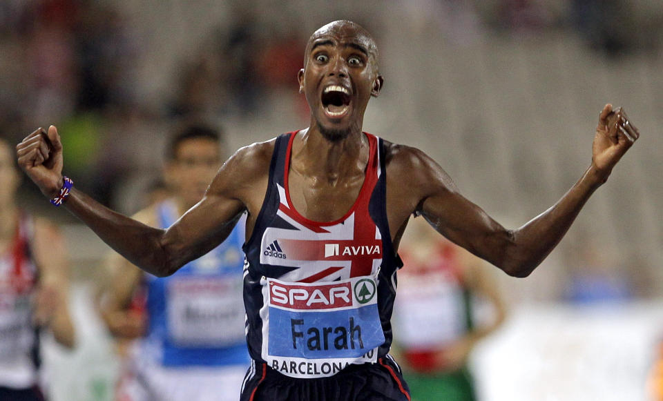 FILE - In this Tuesday, July 27, 2010 file photo made by Associated Press photographer Anja Niedringhaus, Britain's Mo Farah celebrates as he crosses the finish line to win the Men's 10000m event, during the European Athletics Championships, in Barcelona, Spain. Niedringhaus, 48, an internationally acclaimed German photographer, was killed and AP reporter Kathy Gannon was wounded on Friday, April 4, 2014 when an Afghan policeman opened fire while they were sitting in their car in eastern Afghanistan. (AP Photo/Anja Niedringhaus, File)