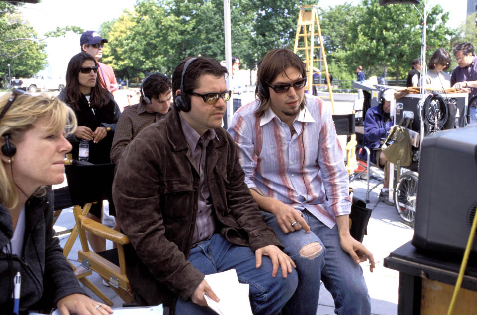 Co-writer/directors Eric Bress (left) and J. Mackye Gruber review a shot on the set of 2004's thriller, The Butterfly Effect. (New Line Cinema/Alamy)