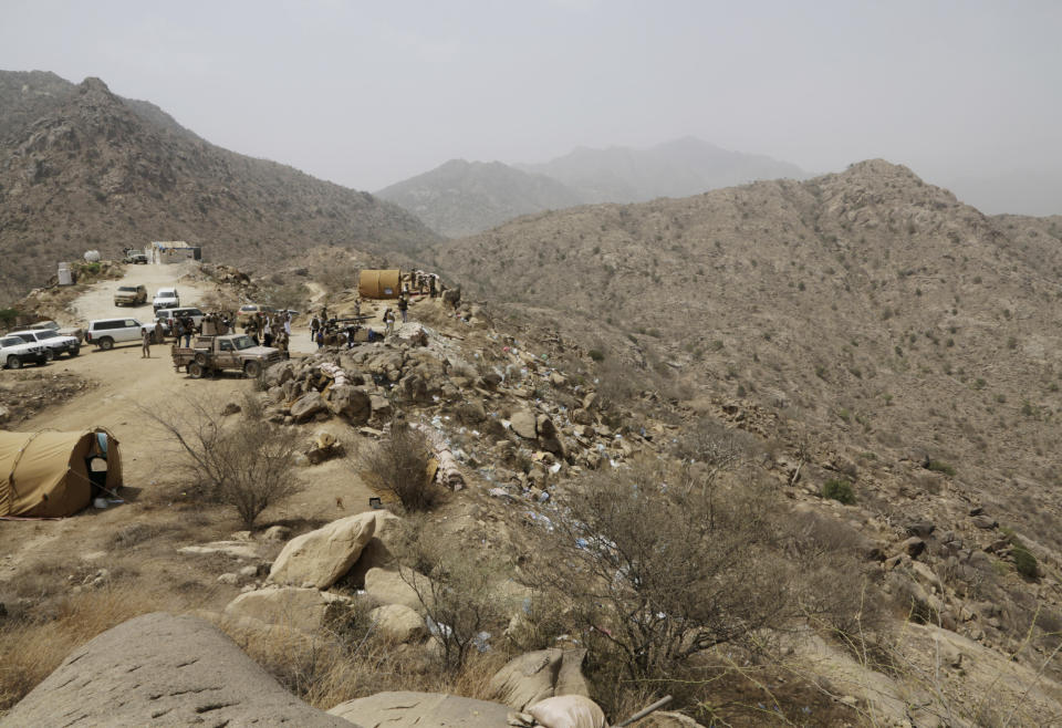 FILE - In this April 20, 2015 file photo, Saudi soldiers work at the border with Yemen in Jazan, Saudi Arabia. Houthi rebels in Yemen have blocked half of the United Nations’ aid delivery programs in the war-torn country — a strong-arm tactic to force the agency to give them greater control over the massive humanitarian campaign, along with a cut of billions of dollars in foreign assistance, according to aid officials and internal documents obtained by The Associated Press. (AP Photo/Hasan Jamali, File)