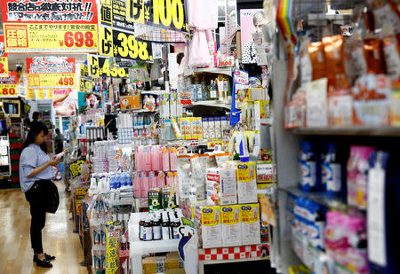 Shoppers browse products at Japanese discount retailer Don Quijote Holdings' store in Tokyo, Japan, June 18, 2018. REUTERS/Kim Kyung-Hoon