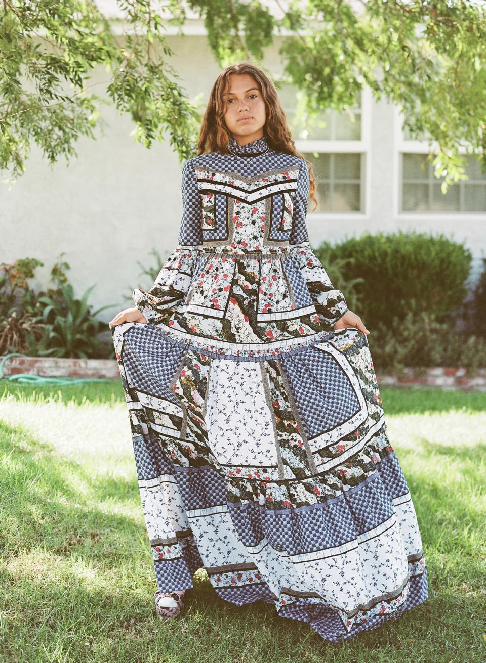 Dress, Erdem. Locket, Sasha Samuel.