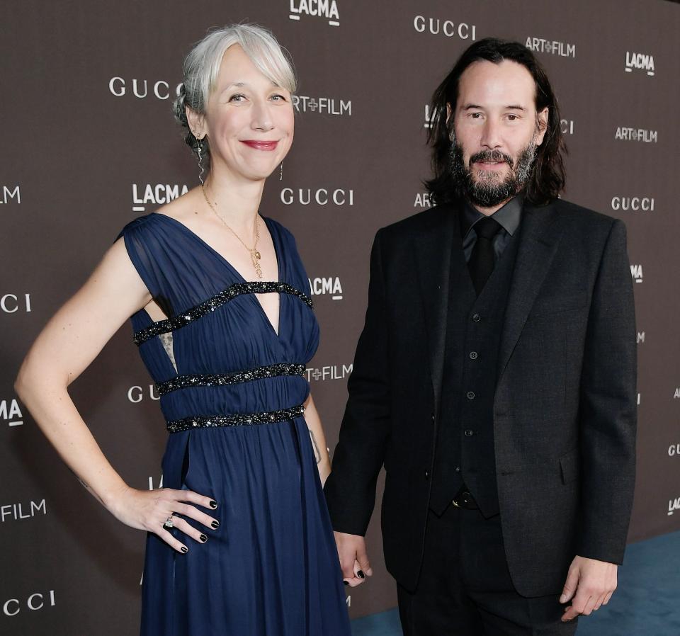 Alexandra Grant and Keanu Reeves hold hands at a Los&nbsp; 2019 LACMA 2019 Art + Film Gala in November. (Photo: Neilson Barnard via Getty Images)