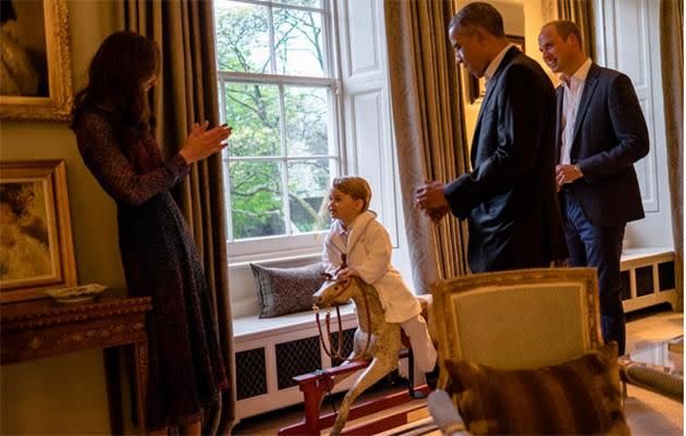 Kate Middleton claps as Prince William and Barack Obama smile at Prince George.