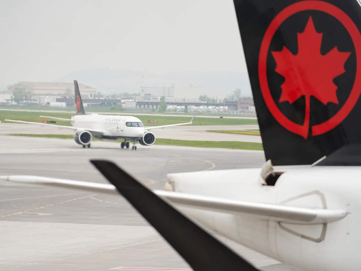 Air Canada has temporarily suspended the direct flight from Fort McMurray to Toronto.  (Geoff Robins/AFP/Getty Images - image credit)