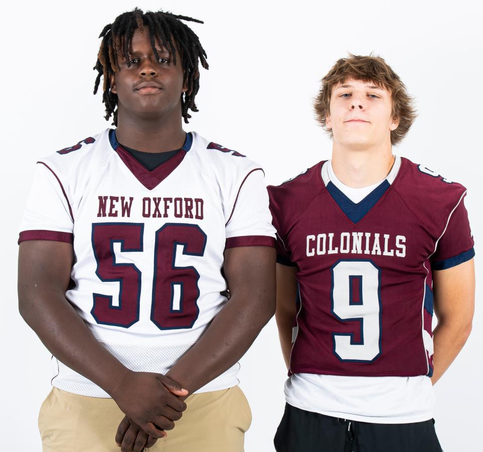 New Oxford football players Micah Smith (56) and Tyler Arigo (9) pose for a photo during YAIAA football media day on Tuesday, August 1, 2023, in York. 