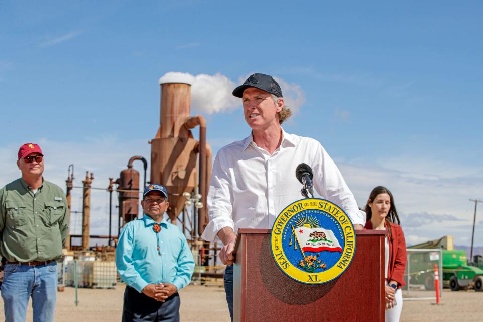 California Governor Gavin Newsom speaks during a press conference at Controlled Thermal Resources as lithium extraction takes place behind him in Calipatria, Calif., on Monday, March 20, 2023. 