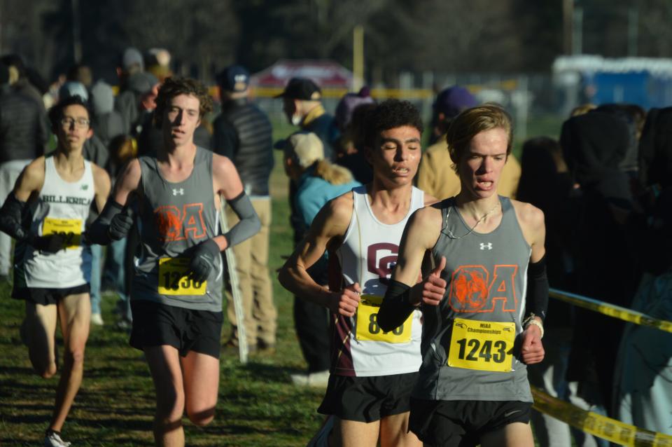 Oliver Ames runners Brendan Thomas (bib No. 1243) and Aidan Dupill (third from right) finished fifth and seventh, respectively, at the MIAA boys cross country Div. 1 state championship on Saturday, Nov. 19, 2022, at Fort Devens.