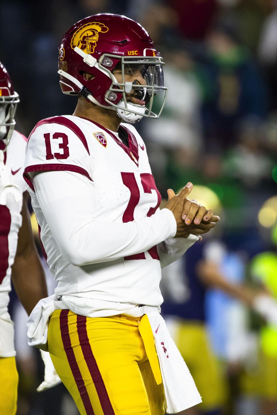 USC quarterback Caleb Williams gets a play from the sideline during game against Notre Dame, Oct. 14, 2023, in South Bend, Ind. | Michael Caterina, Associated Press