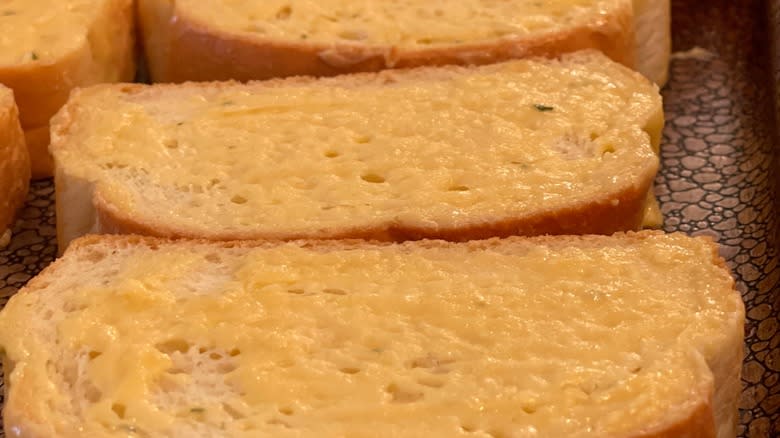 Buttered Texas toast on pan