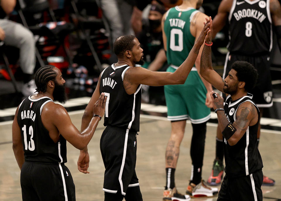 James Harden, Kevin Durant and Kyrie Irving are rolling in the playoffs. (Elsa/Getty Images)