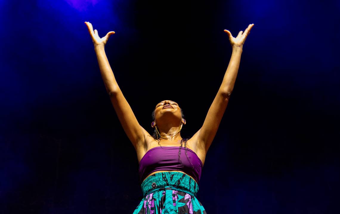 Allison Russell greets the crowd as she opens for Hozier in concert at Coastal Credit Union Music Park at Walnut Creek in Raleigh, N.C., Saturday night, April 20, 2024.