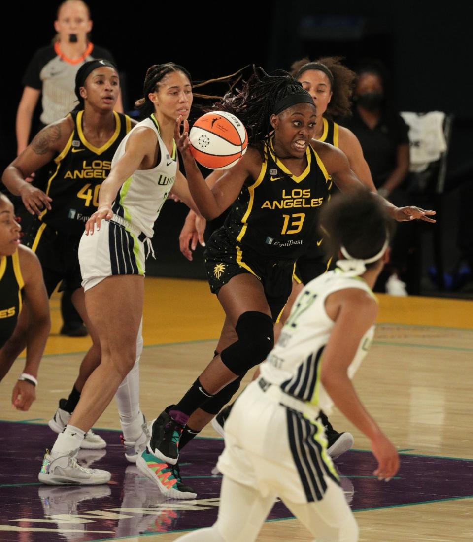 The Sparks' Chiney Ogwumike starts a fast break after grabbing a rebound May 14, 2021.